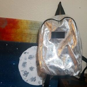 Tigi smalll Holographic metallic backpack
